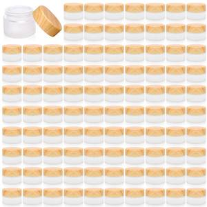 lot 20194 image: 32 Pcs Glass Cosmetic Containers 5 Grams Round Frosted Cosmetic Jars with Leak proof lids Empty glass sample Jars Scrub Balm Lotions Sample Containers for Makeup Lotion Lip Balm Eye Cream - Retail $22