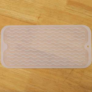 lot 12152 image: MicoYang Silicone Dish Drying Mat for Multiple Usage,Easy clean,Eco-friendly,Heat-resistant Silicone Mat for Kitchen Counter or Sink,Refrigerator or Drawer Liner Translucent S 12 inches x 6 inches - Retail $8