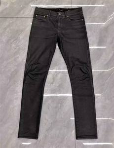 lot 2042 image: Mens Basic Black Jeans, 34W 30L