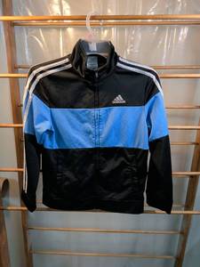 lot 41 image: Adidas Kids Track Jacket Black and Blue Size M (1012)