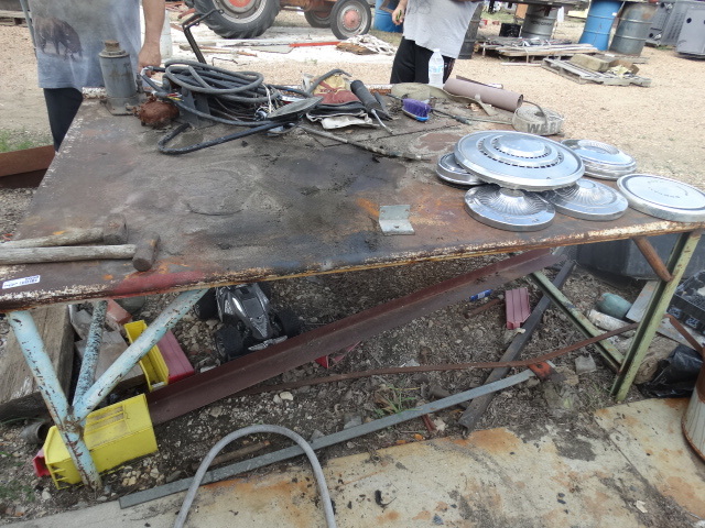 lot 5650 image: Large metal heavy duty shop table w contents