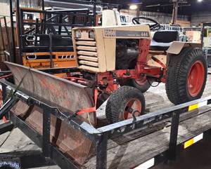 lot 1076 image: 1980 Case 444 Hydraulic Drive Tractor w Blade Attachment. Does Not Start - No Spark to Plug Per Seller. Trailer Sells Separate on Previous Lot