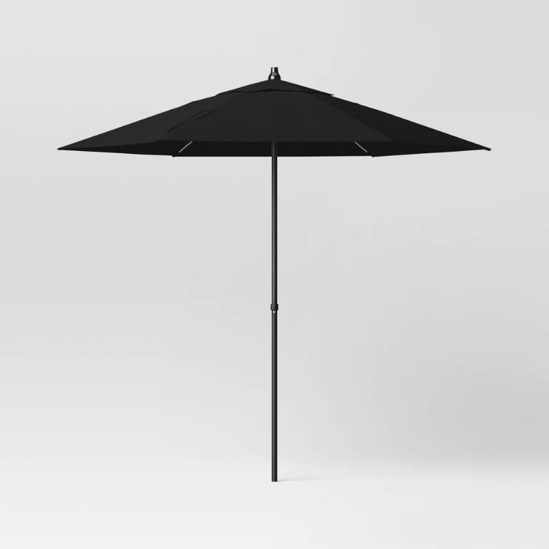 lot 39998 image: 7.5 Round Outdoor Patio Market Umbrella Black - Room Essentials�� Steel Frame, Push-Up Lift, No Tilt - Retail $70