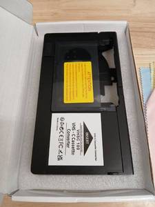 lot 40504 image: VHS-C to VHS Cassette Adapter Converter - Retail $15