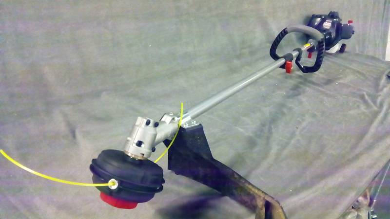 lot 2292 image: Troy-Bilt 2-cycle model tb2044xp gas weed eater with Straight Shaft
