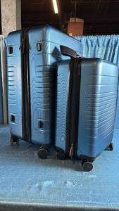 lot 7040 image: 2-Piece Hardside Luggage Set in Metallic Blue