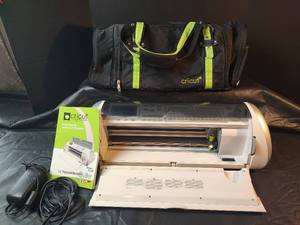 lot 290 image: Cricut Expression 24 Electronic Cutting Machine with Carrying Bag
