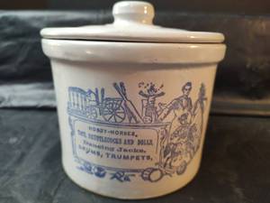 lot 343 image: Vintage Stoneware Crock with Lid with Ads of Childrens Toys
