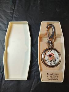 lot 370 image: Vintage Official Armitron Looney Tunes Taz Pocket Watch