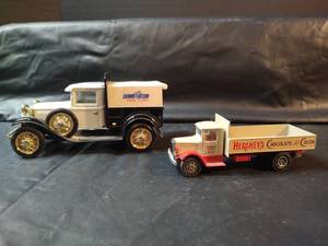 lot 380 image: Vintage Die Cast Hersheys and Dominator Model A Delivery Trucks Set, Dominator is a Piggy Bank with Key