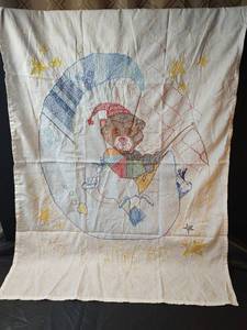 lot 411 image: Cross Stitch Bear with Falling Stars Quilt Topper