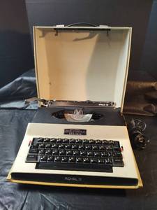 lot 468 image: Royal Apollo 10 Electric Manual Typewriter in Original Case, Chester Tower Typewriter Company of Wichita Kansas