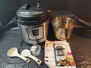 lot 515 image: Instant Pot Electric Pressure Cooker with Accessories
