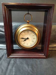 lot 526 image: Sterling & Noble Brass Round Clock in 7.5 x 9.5 Wood Frame