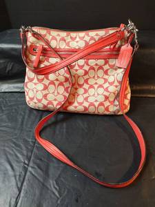 lot 557 image: Coach Signature Pattern Crossbody
