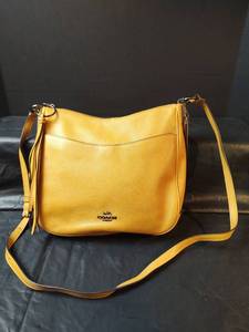 lot 558 image: Coach Yellow Leather Crossbody Bag