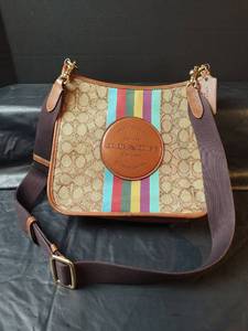 lot 559 image: Coach Rainbow Stripe Signature Crossbody Bag
