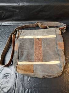 lot 584 image: Mona B Canvas and Leather Messenger Bag