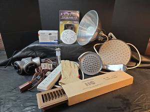 lot 598 image: New Shower Heads, Floor Diffuser,  Work Lamp, Pest Repeller, and More