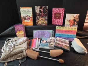 lot 630 image: Books, DVDS, Cedar Shoe Stretchers,  Medication Planner, Heating Pad, and More