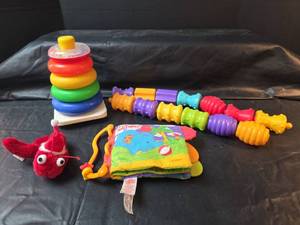 lot 643 image: Fisher Price Baby Toy Bundle - Ring Stack and Bright Starts Book
