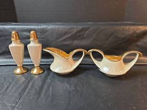 lot 661 image: Pearl White and Gold Salt & Pepper Shaker Set with Cream & Sugar Set