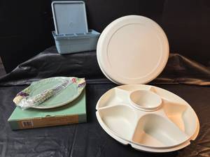 lot 679 image: Tupperware Vegetable Keeper, Tupperware Stow & Go CraftJewelry Keeper,  and New Pfaltzgraff Cheese Tray with Sculpted Slicer