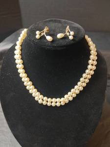 lot 700 image: Two Pearl Necklaces with Earrings