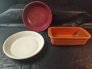 lot 725 image: Monmouth Pottery Pie Plates with Orange Bread Pan Made in USA