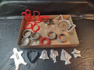 lot 730 image: Vintage Metal Cookie Cutters, Canning Jar Lids, Cookie Cutter Set and More