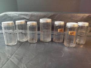 lot 731 image: Vintage Glass Spice Jars with Metal Lids