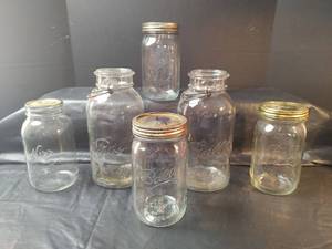 lot 744 image: Ball Mason Glass Canning Jars Collection - 4-Qt Jars and 2-12g Jars