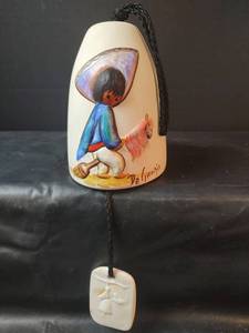 lot 891 image: Signed DeGrazia Child with Stick Pony Wind Bell, Handpainted