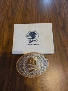 lot 933 image: NIB North American Hunting Club Life Member Belt Buckle