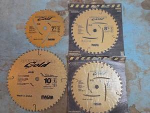 lot 1679 image: Magna American Pride Gold Saw Blade Set