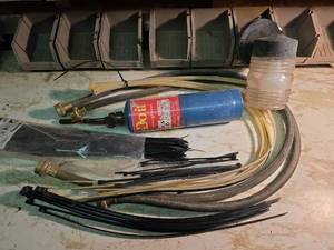 lot 2033 image: 1960s Hot Rod Propane Torch, Assorted Zip Ties, Washer Hoses, and Porch Light
