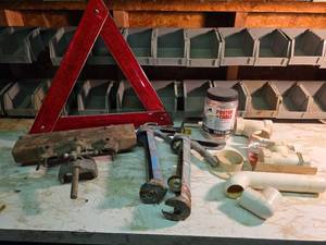 lot 2042 image: Wooden Woodworking Plane, Plumbing Supplies,  Emergency Reflector, and More