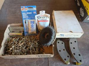 lot 2084 image: Silver Brand FSD50 Brake Pads with Permatex Quiet Kit, 2-cycle Oil, Screws, and More