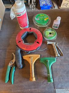lot 2092 image: Gardner Bender Cable Snake Set with Trimmer Line, Sprinklers, and Garden Pesticide