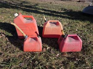 lot 3026 image: Red Plastic Gas Cans - Set of 4