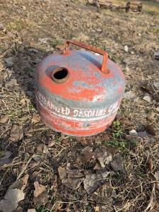 lot 3036 image: 1960s Round Metal Gasoline Can