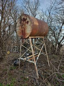 lot 3045 image: Large Steel Storage Tank with Stand- you may need saw to remove.