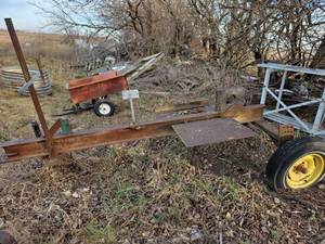 lot 3048 image: Steel Farm Implement Cart for Wood Splitting- will need new tires to remove