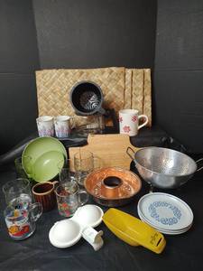 lot 3034 image: Assorted Kitchen Collection - Jello Mold, Stainless Steel Strainer, Cheese Cutting Board, Placemats and More