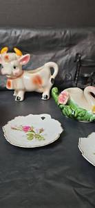 lot 3068 image: Decorative Collection - Ceramic Cow Creamer and Rose Plates Made in Japan, Ceramic Swan Candle Holders and More