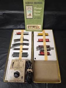 lot 3094 image: Vintage 1968 Aurora Postage Stamp Trains Micro-Gauge Set