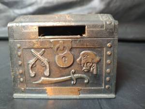 lot 3265 image: Vintage Rocky Mountain Iron Lock Piggy Bank Filled with Pennies