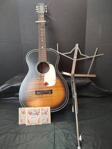 lot 3288 image: 1950s Silvertone Acoustic Guitar - Tobacco Sunburst Finish and Music Stand