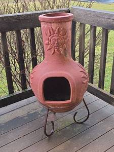 lot 53 image: Terracotta Chiminea with Sun Design