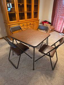 lot 64 image: Cosco Card Table with 4 Folding Chairs Set